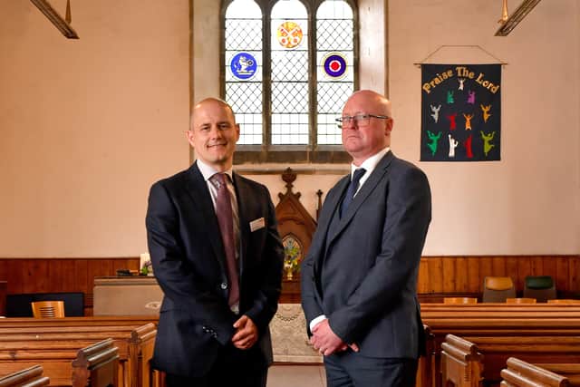 Adam Checkley from Network Rail and John Robson from CrossCountry Trains, with the new window behind them