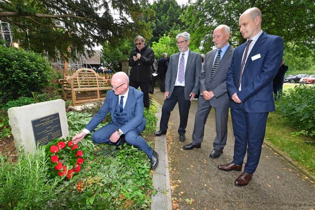 John Robson, from CrossCountry Trains, Adam Checkley from Network Rail, Joe Craen and Malcolm Garner lay the wreath at the dedication service