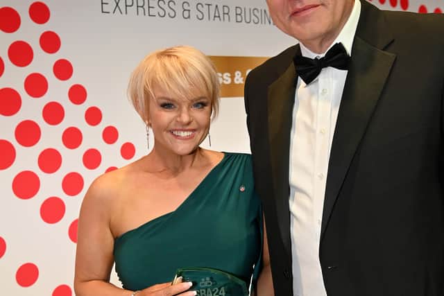 Employee of the year Lydia Hopley with John Brookes from sponsors Wombourne Windows