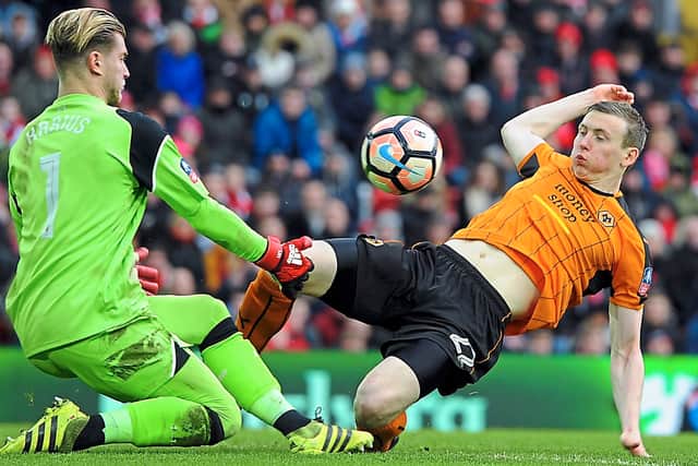 Challenging Liverpool goalkeeper Loris Karius during a famous FA Cup tie (AMA)