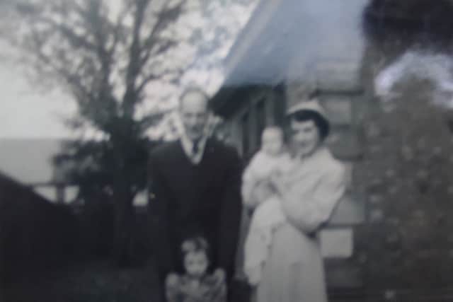 Mary Hart as a baby with her family including her sister