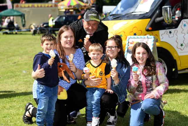 The Davies family enjoy their ice creams.