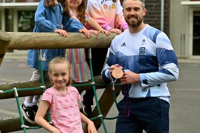 The visit by Olympic medallist Kristian Thomas was the final treat for pupils after their enrichment week. He is pictured with Rachel Jones, Evie Rose-Payne, Elsie Masion and Ella Howells