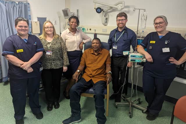 Elliot Pfebve (centre), with (left to right) research sister Hayley Rolfe, colorectal cancer support worker Keely Holloway, oncology consultant Dr Victoria Kunene, oncology consultant Dr Mark Openshaw and research sister Zoe Haygarth.
