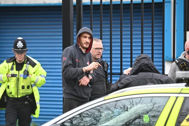 Meta Alban after being arrested on the roof of a giant cannabis factory in Bilston