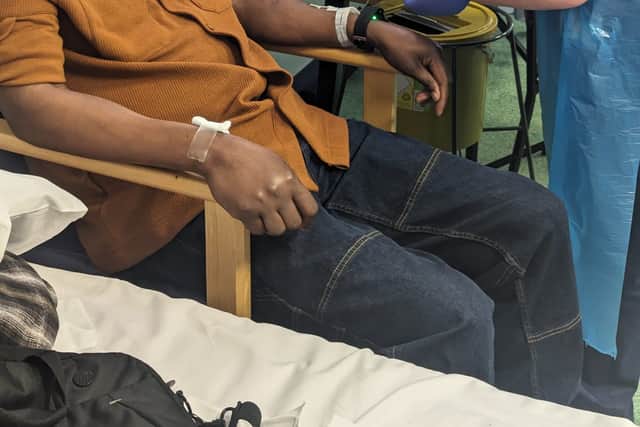 Elliot Pfebve, the first patient in England to have been treated with a personalised vaccine for his bowel cancer, with Hayley Rolfe , a research sister at Queen Elizabeth Hospital Birmingham.