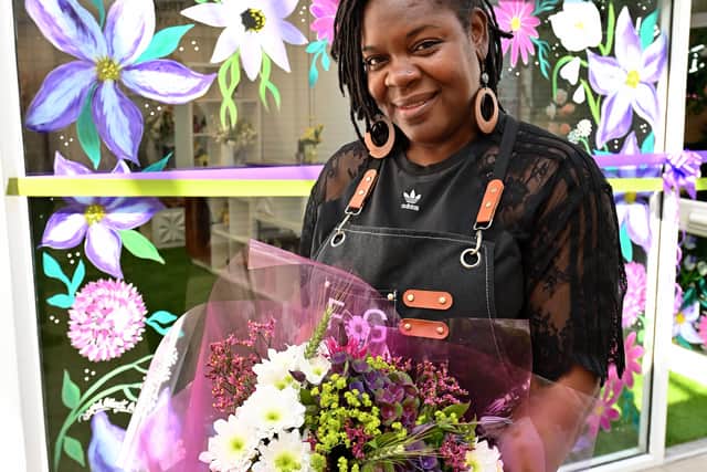 She opens up shop just in time for National Florist Day