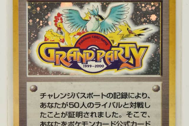The exclusive Pokémon Grand Party card.