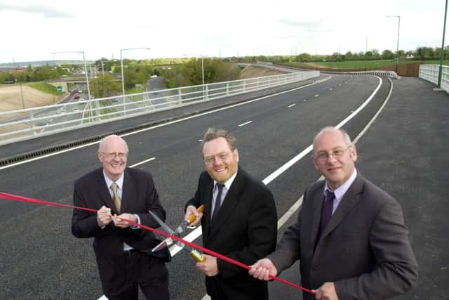 At the opening of a new link road near Birmingham Airport in 2002