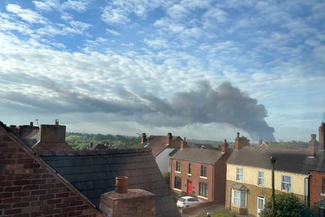 The fire rises above the rooftops in Cannock