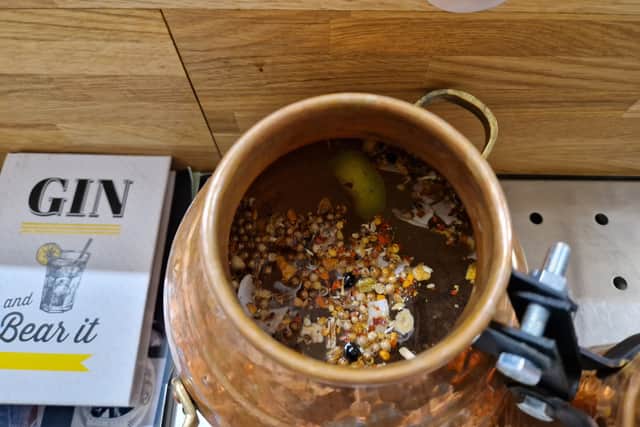 Blend the botanicals with water and alcohol and you get magic