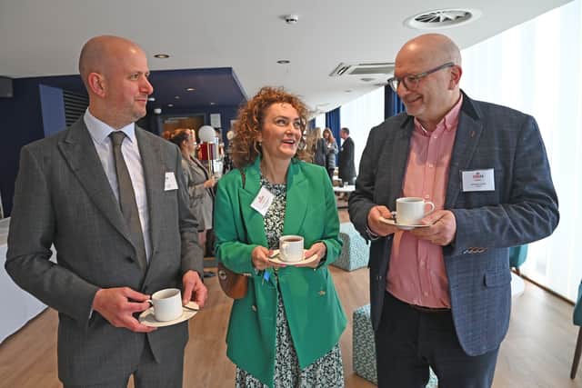 Stuart Perkins, left, Petra Emmerson and Johnathan Dudley, of Crowe