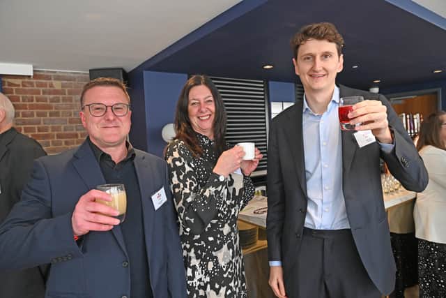 Andy Brabazon, of Carvers, left, Michelle McClure and Jack Carver
