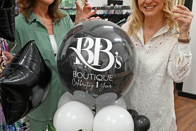  One year celebrations for the success of BB's Boutique, which has been based physically in Perton since March last year. Started during lockdown online and attracting over 5,000 Facebook followers it specialises in catering for all ages and sizes of women providing them with affordable fashion and a good customer service. It is co-owned by Kirsty Bull, wife of Wolves legend Steve (R) and Paula Bawa (L) who are pictured celebrating the birthday of their store.