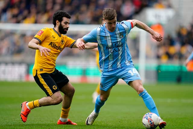 Wolverhampton Wanderers' Rayan Ait-Nouri (left) 