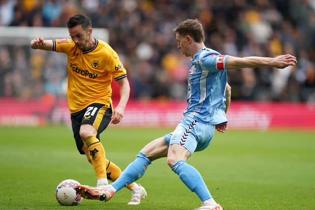 Wolverhampton Wanderers' Pablo Sarabia (left) and Coventry City's Ben Sheaf 