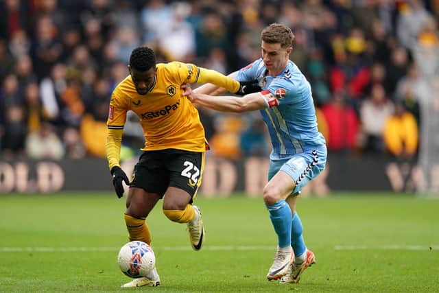 Wolverhampton Wanderers' Nelson Semedo (left) and Coventry City's Ben Sheaf