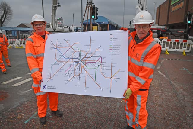 Andy Street and Anne Shaw show off the new TfWM map of the region