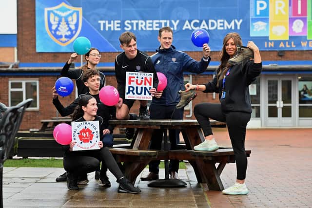 Ruth Leighton pictured with fellow staff member at The Streetly Academy Jonny Boyes and students who are taking part with her in the Royal Sutton Fun Run: Gabrielle Daly aged 14, Seb Monk aged 15, Isabel Monk aged 13 and George Brizell aged 15.