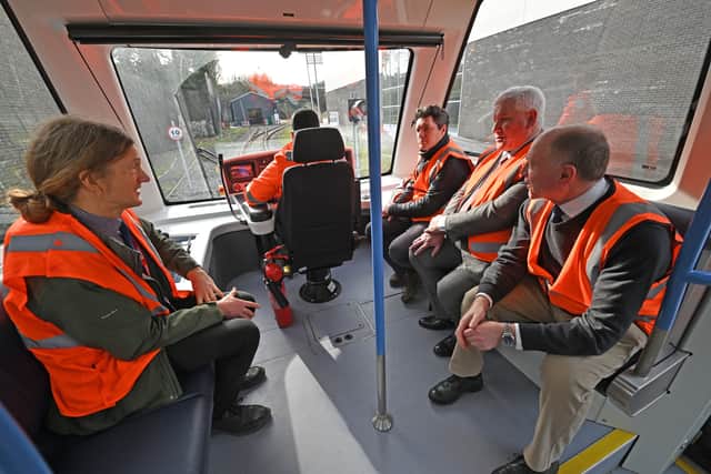 The minister and guests are given a ride on the VLR along the testing course