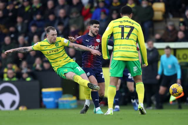 Alex Mowatt battles with Ashley Barnes (Photo by Adam Fradgley/West Bromwich Albion FC via Getty Images).