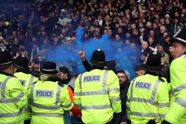 Police form a line to try and control trouble as it erupts in the stadium (Photo by Adam Fradgley/West Bromwich Albion FC via Getty Images).