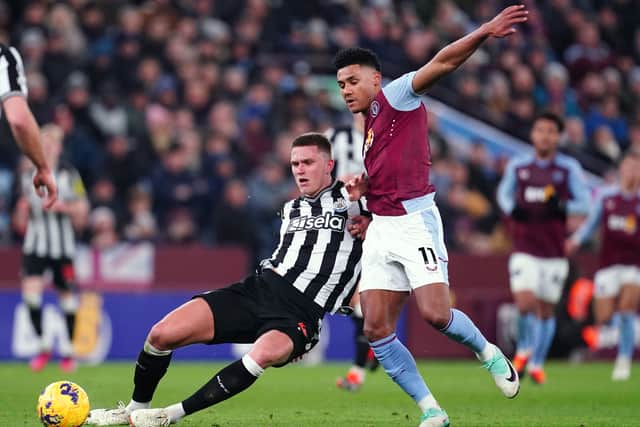 Newcastle United's Sven Botman and Aston Villa's Ollie Watkins