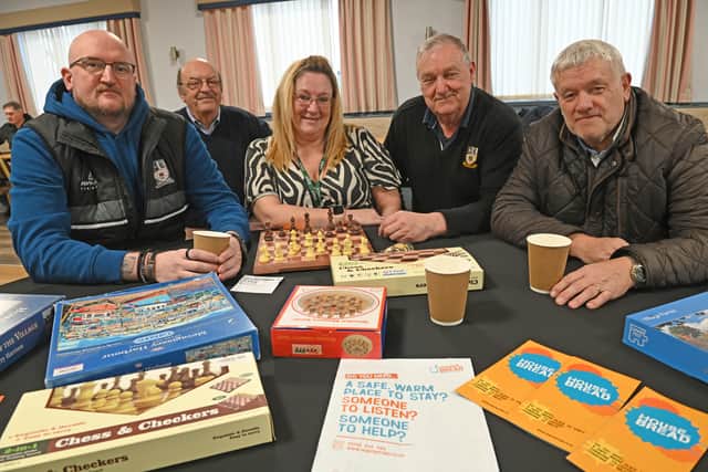 Shane McDonald, Gary Bloor, Alison Broom, Andy Fearn and Harry Shaw enjoy the warm space at Stafford Rangers