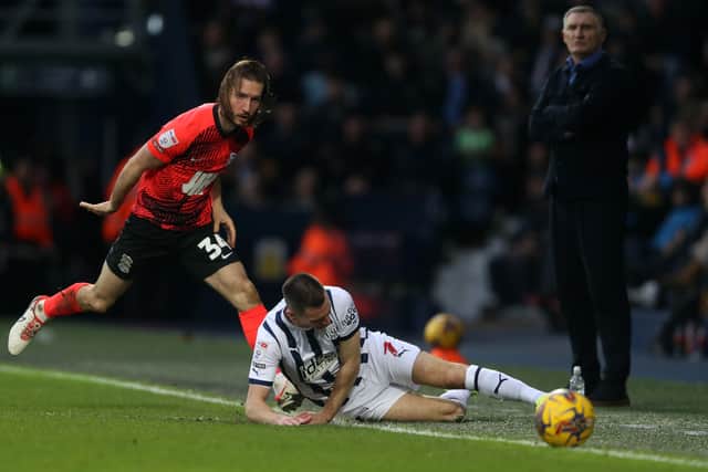 Ivan Sunjic of Birmingham City fouls Jed Wallace (Photo by Adam Fradgley/West Bromwich Albion FC via Getty Images).