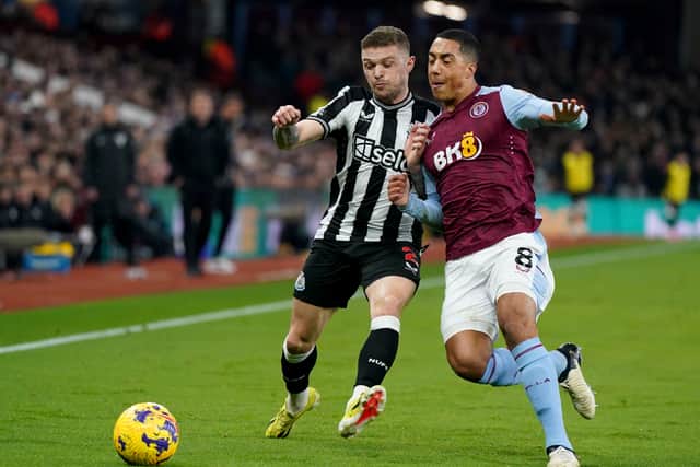 Newcastle United's Kieran Trippier and Aston Villa's Youri Tielemans battle for the ball