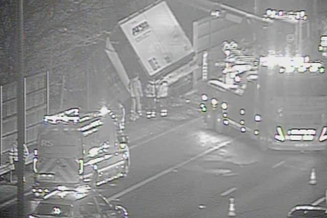 Shocking traffic cam footage shows moment lorry blows tyre and ploughs ...