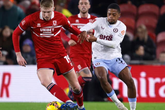 Middlesbrough's Josh Coburn and Aston Villa's Leon Bailey