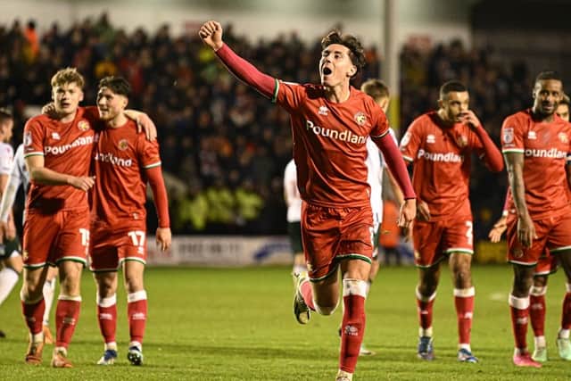 Isaac Hutchinson celebrates making it to 2-1 to the Saddlers (Owen Russell)