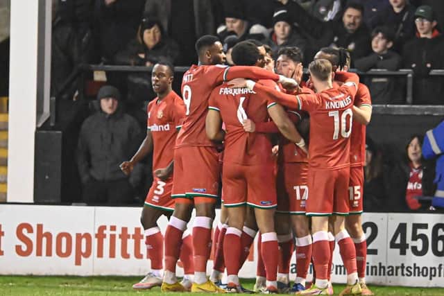 Walsall players celebrate Jack Earing's opener (Owen Russell)