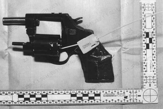 This gun was recovered when police stopped a car on October 13