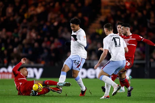 Middlesbrough's Morgan Rogers and Aston Villa's Boubacar Kamara