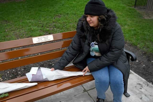 ..Ronan's mum Pooja with flowers on the bench..