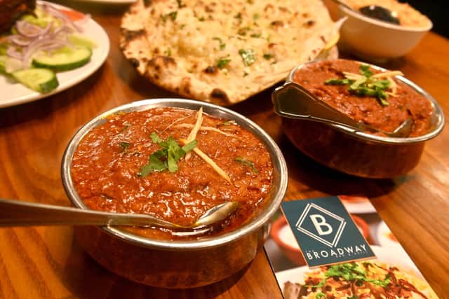 The lamb curry and chicken claypot behind it