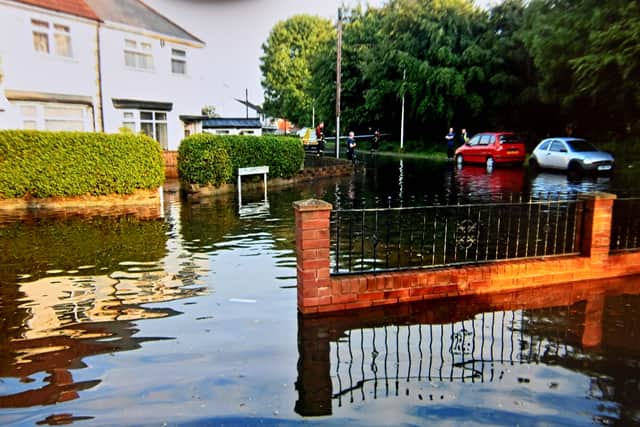 Flooding in Millward Street in Greets Green, West Bromwich.