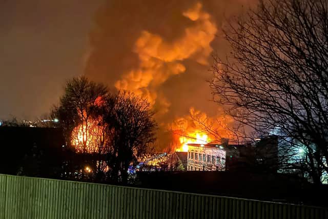The fire and smoke could be seen for the roads passing by the estate. Photo: Ray Burston