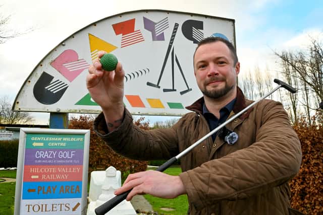 Dan Morris tries out the crazy golf course at Fletchers Family Garden Centre