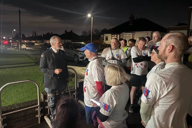 Mr Banks speaks to members of Sedgley Striders ahead of their run
