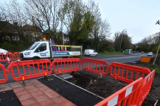 The new crossing is by the junction with Woodcroft Avenue