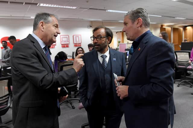 Henry Carver and Sham Sharma make their case to Sir Keir in the newsroom