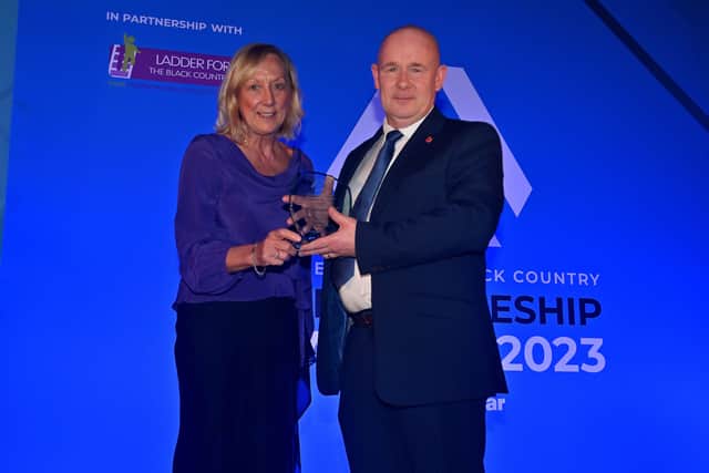 Scott Shenton, of Sandwell and West Birmingham NHS Trust, is presented with his award