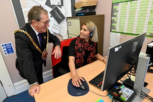 Mayor of Wolverhampton Dr Michael Hardachre with help line manager Kulvinder Kaur