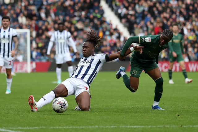 Brandon Thomas-Asante stretches for the ball (Photo by Adam Fradgley/West Bromwich Albion FC via Getty Images).