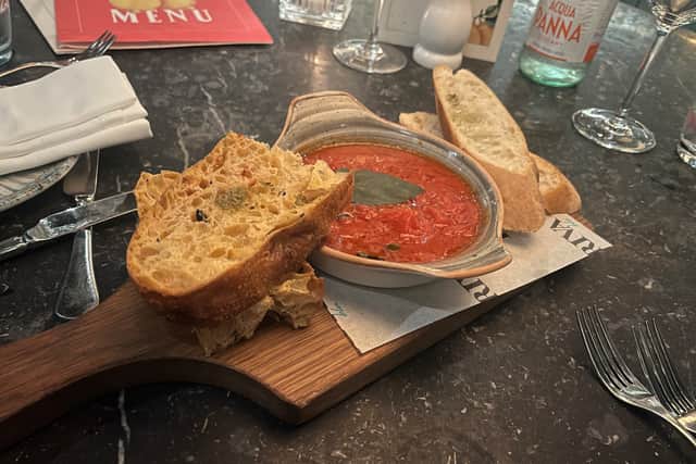 Scarpetta Con Pomodoro Di San Marzano (sweet tomato and garlic sauce with freshly baked sourdough bread).