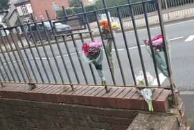 Floral tributes left along Thorns Road in Quarry Bank following a fatal road crash