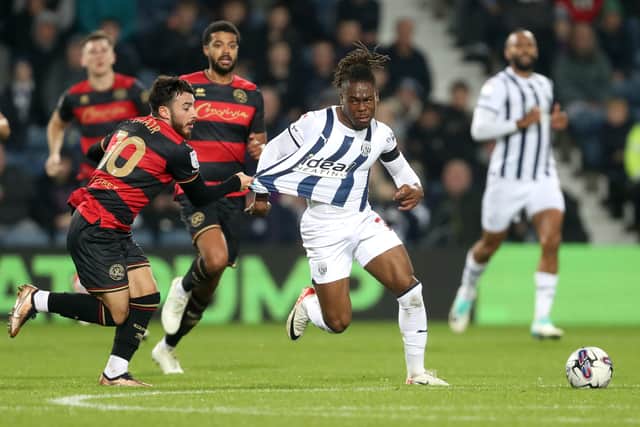 Brandon Thomas-Asante is stopped in his tracks by Ilias Chair (Photo by Adam Fradgley/West Bromwich Albion FC via Getty Images).